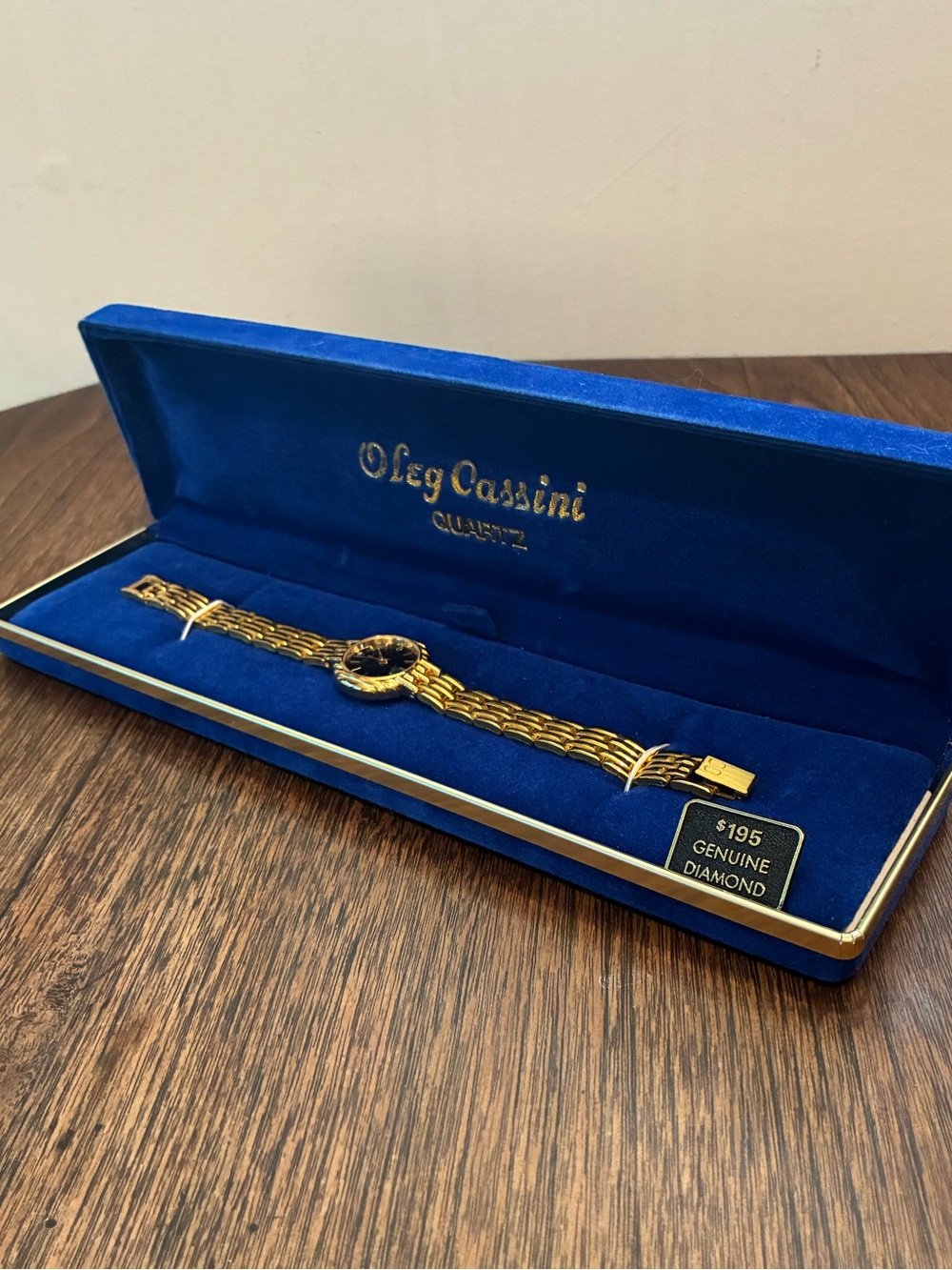 Oleg Cassini Swiss Quartz & Diamond Watch with Gold Tone Basket Weave Band